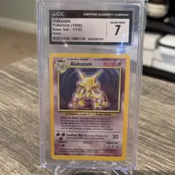 Wizards of the Coast Alakazam 1/102 Base Set Holo CGC 7 Pokemon Card - Image 1
