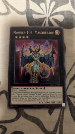 Yu-Gi-Oh! Number 104: Masquerade OP27-EN010 Super Rare - Near Mint - Image 1