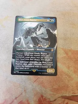 Blue, Loyal Raptor Borderless Universes Beyond Jurassic World MTG NM - Image 1