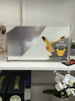Pokemon Celebrations 25th Anniversary Ultra Premium Collection Sealed + Acrylic - Image 1