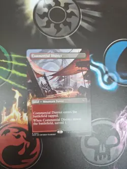 Commercial District (Borderless) Murders at Karlov Manor Rare Land 324 MTG Magic - Image 1