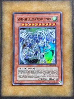 Yugioh Stardust Dragon/Assault Mode DP09-EN001 Super Rare LP - Image 1