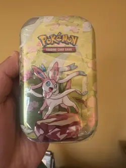 Pokemon TCG Prismatic Evolution Mini Tin x1 - Image 1