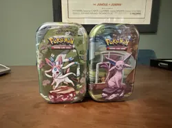 Pokemon TCG Prismatic Evolution Mini Tin x1 - Image 1