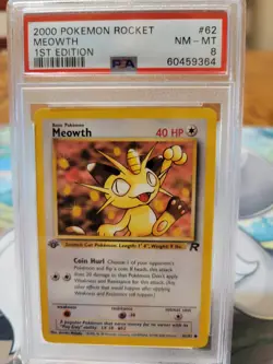 MEOWTH 1ST EDITION TEAM ROCKET POKEMON WOTC CARD #62 PSA 8 NEAR MINT- MINT NEW - Image 1