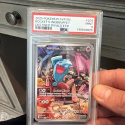 2025 POKEMON SVP DESTINED RIVALS ETB PROMO #203 TEAM ROCKET'S WOBBUFFET PSA 9 - Image 1