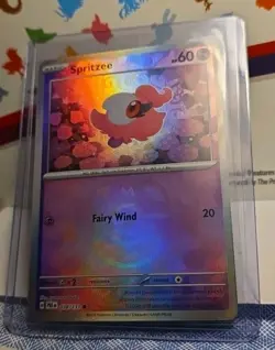 Spritzee 038/131 Prismatic Evolutions Masterball Pattern Holo Pokemon Card - Image 1