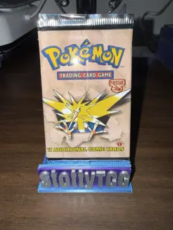 1st edition Pokemon Fossil Booster Pack - Zapdos Art - Image 1