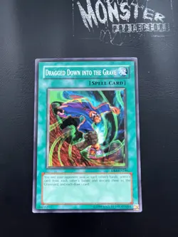 YUGIOH DRAGGED DOWN INTO THE GRAVE COMMON DR1-EN246 - Image 1