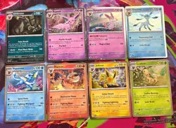 Pokemon Prismatic Evolutions Costco Mini Tins Cosmo Promo Cards (8 Cards Total) - Image 1