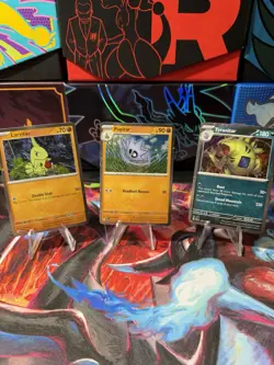 Pokemon TCG Larvitar Pupitar Tyranitar - Cosmo Holo - Image 1