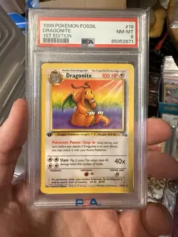 DRAGONITE PSA 8 1999 POKEMON FOSSIL #19/62 1ST EDITION - Image 1