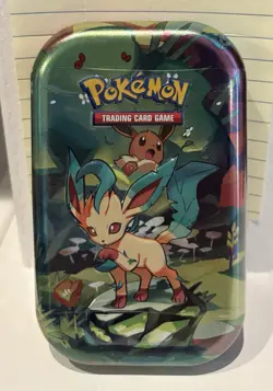 Pokemon Prismatic Evolutions SV8.5 Leafeon Mini Tin Factory Sealed 🌟✨🌙💫 - Image 1