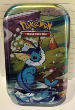 Pokemon Prismatic Evolutions SV8.5 Vaporeon Mini Tin Factory Sealed 🌟✨🌙💫 - Image 1