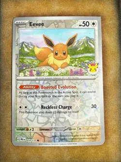 Eevee Prismatic Evolutions 074/131 Holo Pokemon Day 2025 Stamped Promo Card - Image 1