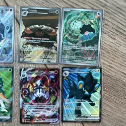 Pokemon TCG Holo Card Lot Delibird, Inteleon, Wooloo - 14 Cards - Image 3