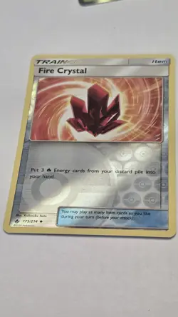 Pokemon TCG SM Unbroken Bonds Fire Crystal 173/214 Reverse Holo NM - Image 1