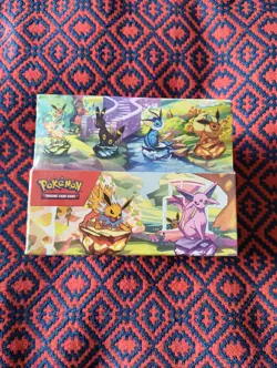 Pokemon TCG Scarlet & Violet Prismatic Evolutions Mini Tins Pack of 8 - Image 1