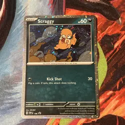 Scraggy SVP186 COSMOS HOLO SWIRL Black Star Promo DOUBLE SWIRL TCG 2025 S&V NM - Image 1