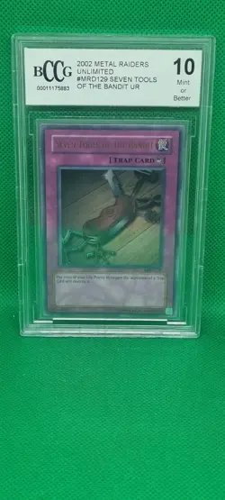 Beckett 10 Yugioh Seven Tools of The Bandit Metal Raiders Ultra Rare MRD-129 MT - Image 1