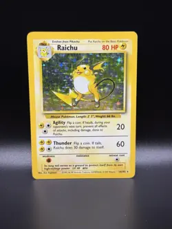 1999 POKEMON BASE SET UNLIMITED #14/102 RAICHU HOLO RARE - Image 1