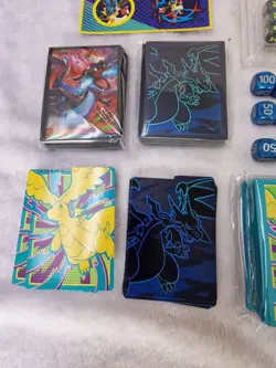 Large Pokemon TCG Evolutions Bundle - Dice Sets, Manuals, Card Sleeves, Stickers - Image 5