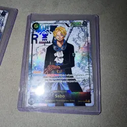 One Piece Sabo OP13-120 SEC Parallel ENGLISH Carrying On His Will in hand - Image 2