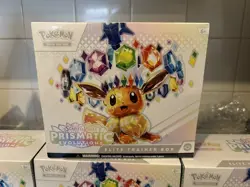 Pokemon TCG Prismatic Evolutions Elite Trainer Box (small cut on corner) - Image 1