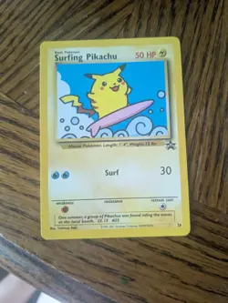 Pokemon Pikachu #28 Surfing Black Star Promo - Image 1