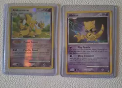 Alakazam holo and Abra basic pokemon cards in good condition - Image 1