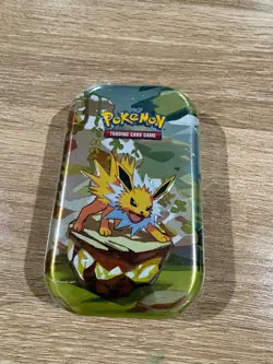 Pokemon Mini Tin Jolteon Scarlet & Violet Prismatic Evolutions Factory Sealed - Image 1