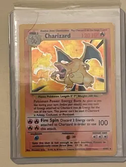 Pokemon TCG Charizard Rare Holo Card 4/102 in great condition - Image 1