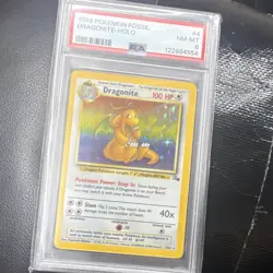 Pokemon 1999 Fossil Dragonite 4/62 Holo Rare Unlimited PSA 8 English - Image 1