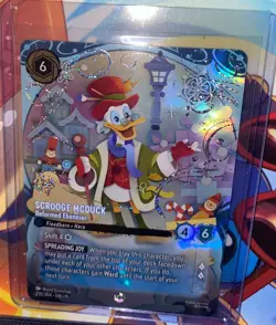 Disney Lorcana Winterspell Enchanted Scrooge McDuck, Reformed Ebenezer 235/204 - Image 1