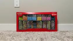 Pokemon Prismatic Evolutions Costco Mini Tins 8 Pack - New & Sealed - Image 1