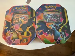 Pokemon TCG: Mega Charizard X & Mega Charizard Y Tin Set Of 2 - Image 1