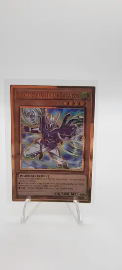 Yugioh Elemental HERO Stratos MAGO-EN004 Gold Rare 1st Ed NM - Image 1
