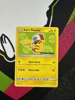 Pokemon 2017 Ash's Pikachu TCG Black Star Promo Card SM112 Alola - Image 1