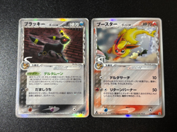 [US Duty Inc] Umbreon delta 069/086 Flareon 018/086 2005 Japanese Pokemon Card - Image 1
