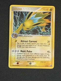 Jolteon 8/115-Reverse Holo Rare STAMPED-Pokemon TCG: Ex Unseen Forces LP - Image 1