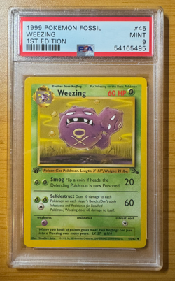 1999 Pokemon Fossil #45 Weezing 1st Edition PSA 9 - Image 1