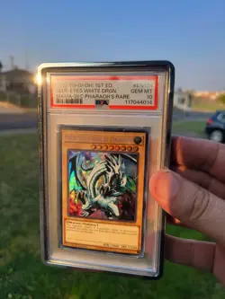 2022 Yu-Gi-Oh! Blue-Eyes White Dragon MAMA-EN104 Pharaoh Secret Rare PSA 10 - Image 1