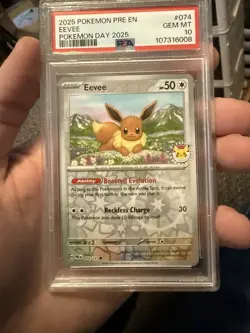 2025 POKEMON PRE EN-PRISMATIC EVOLUTIONS POKEMON DAY 2025 #074 EEVEE PSA 10 - Image 1