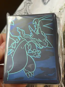 Pokemon Phantasmal Flames Sealed ETB Card Sleeves (65) featuring Charizard - Image 1