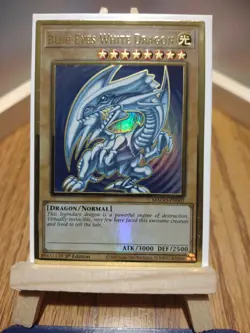 YuGiOh Card MAGO-EN001 Blue-Eyes White Dragon Premium Gold Rare 1st Edition TCG. - Image 1