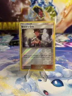 Brock's Grit 135/181 Reverse Holo SM-Team Up Pokemon TCG - Image 1
