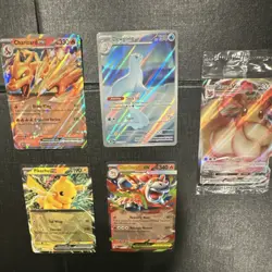 Pokemon TCG Card Bundle - Charizard EX, Pikachu EX, Eevee VMAX, Dewgong - Image 1