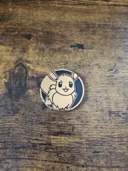 Pokemon SV Prismatic Evolutions Eevee Pokemon Day 2025 Promo Coin - Image 1