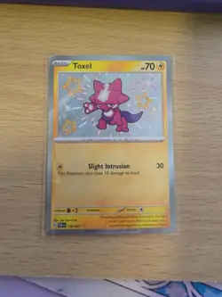 Toxel 140/091 Shiny Holo Paldean Fates Pokemon Card - Image 1