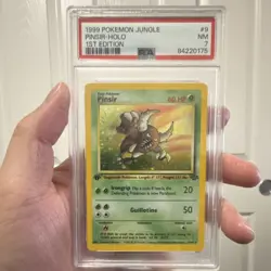 1999 Pokemon TCG Jungle Pinsir 1st Edition Holo Rare 9/64 PSA 7 Card Stock - Image 1